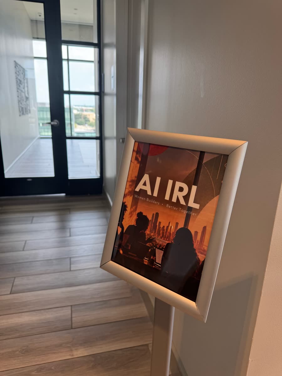 Standing AI IRL sign — Women Builders · Better Together — at The McKinley